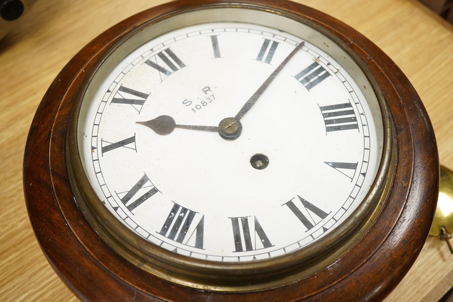 A mahogany wall dial fusee timepiece, the eight inch dial painted with ‘S.R. 10837’, intended to stand for Southern Railway, the reverse of the case also stamped with 10837